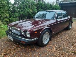 Image result for Sebring Red 1986 Jaguar