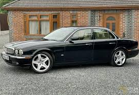 Image result for Black Cherry 2006 Jaguar