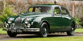 Image result for Dark Green 1959 Jaguar