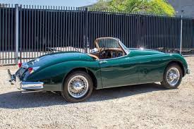 Image result for Dark Green 1959 Jaguar