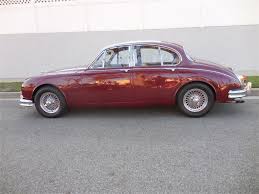 Image result for Maroon 1962 Jaguar