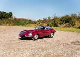 Image result for Maroon 1962 Jaguar