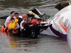TransAsia pilots hailed as heroes for steering plane into river.