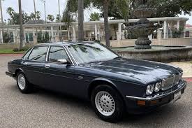 Image result for Black Cherry 1991 Jaguar
