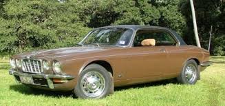 Image result for Carriage Brown 1977 Jaguar