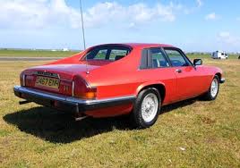Image result for Sebring Red 1986 Jaguar