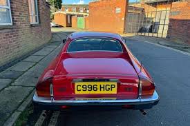 Image result for Sebring Red 1986 Jaguar