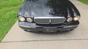 Image result for Black Cherry 2006 Jaguar