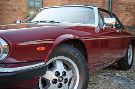 Image result for Sebring Red 1986 Jaguar