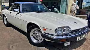 Image result for Nimbus White 1987 Jaguar