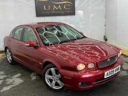Image result for Persian Red Pearl 2008 Jaguar