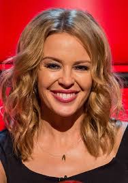 And singer Kylie Minogue looked gorgeous as she appeared on The Voice UK this weekend showcasing a glamorous yet natural make-up look. - d0dd7b2e-1315-48d8-bc36-40426ffdc8ab_kylie-minogue-the-voice-2014-beauty-how-to-headshot