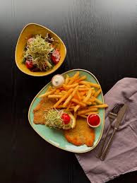 Image result for schnitzel mit pommes