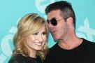 Simon Cowell appears to flirt with fellow X Factor USA judge Demi
