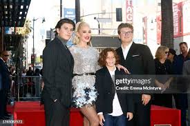 Image result for Queen B by Bumbleride $428 Gwen Stefani and Gavin Rossdale with Kingston and Zuma at the LA zoo