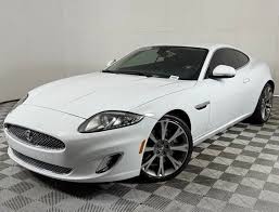 Image result for White Onyx 2002 Jaguar
