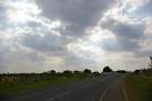 TF6006 : Scattering of sunlight by cloud over road - via Daymix