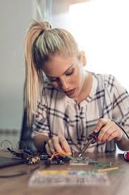 Image result for woman soldering