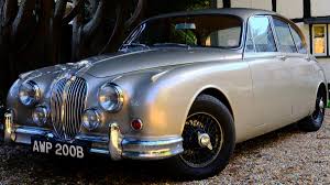 Image result for Golden Sand 1962 Jaguar