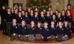 Nuala McGoran - conductor (left) and Maria Gough - Principal (right) pictured with St Joseph\u0026#39;s Primary School Choir at the 2006 Carols in the City Concert ... - 2006-9