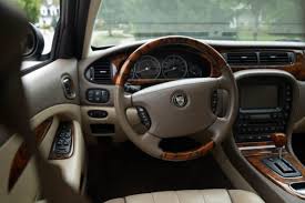 Image result for Winter Gold Pearl 2007 Jaguar