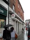near to Salisbury, Wiltshire, Great Britain. Umbrellas up in Market Place - via Daymix