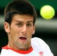 Serbian Novak Djokovic eyes the ball as he plays Spanish Rafael Nadal during ... - novak-djokovic