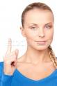 Stock photo: woman with her finger up