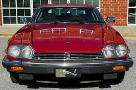 Image result for Sebring Red 1986 Jaguar