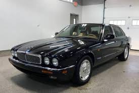 Image result for Black Cherry 1991 Jaguar