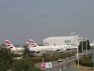 Airliners on the ground, Heathrow. Viewed from pedestrian footbridge by - via Daymix