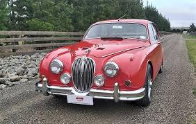Image result for Carmen Red 1961 Jaguar