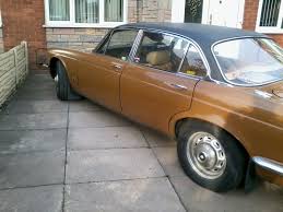 Image result for Chestnut Brown 1979 Jaguar
