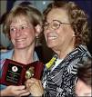 Inéz Casiano (right) receives