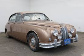 Image result for Golden Sand 1962 Jaguar
