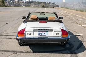 Image result for Glacier White 1989 Jaguar