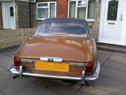 Image result for Chestnut Brown 1979 Jaguar
