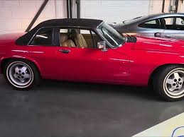 Image result for Sebring Red 1986 Jaguar