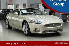 Image result for Winter Gold Pearl 2007 Jaguar