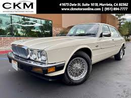 Image result for Glacier White 1988 Jaguar
