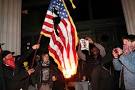 Michael Shaw: Reading the Pictures: "Occupy" Flag Burning Photo as ...