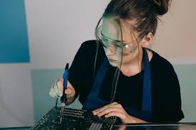 Image result for woman soldering