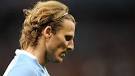 Uruguay striker Diego Forlan played through injury in his team's semifinal ... - forlan-diego-get-100707-584