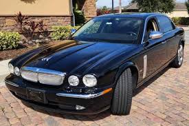 Image result for Black Cherry 2006 Jaguar