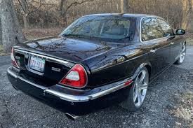 Image result for Black Cherry 2006 Jaguar