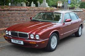 Image result for Phoenix Red 1999 Jaguar