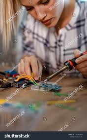 Image result for woman soldering