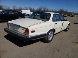 Image result for Nimbus White 1987 Jaguar