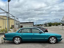 Image result for Bright Turquoise 1995 Jaguar
