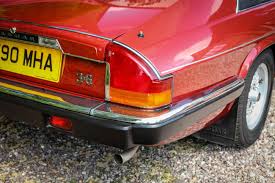 Image result for Grenadier Red 1987 Jaguar